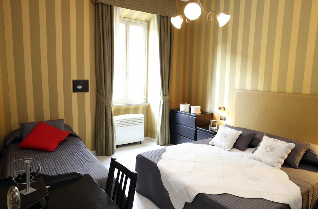 Caracciolo Guest House โรม ห้อง รูปภาพ